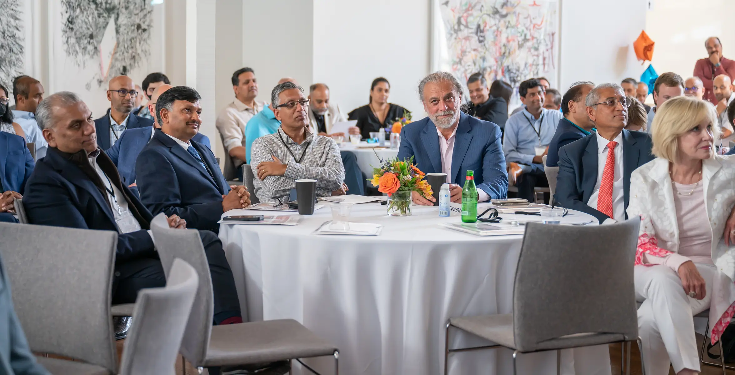 Founders and investors around a table at Venture Dock